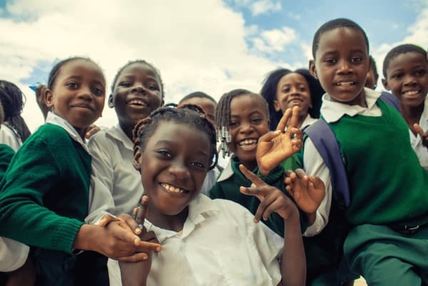 Happy African students in a learning environment